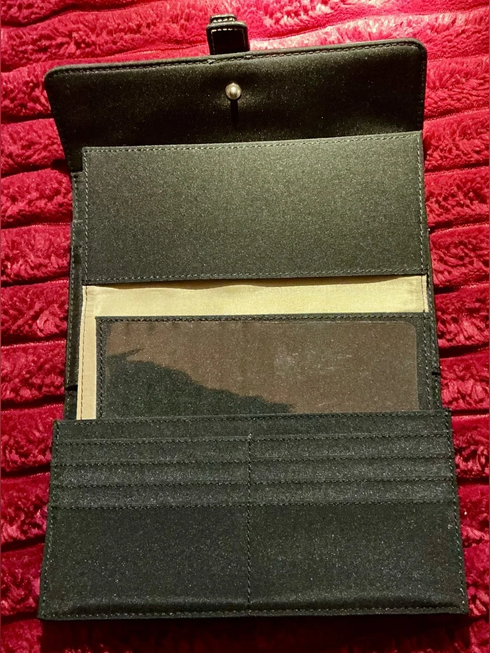Woman’s Black Buckle-Strap Clutch Wallet